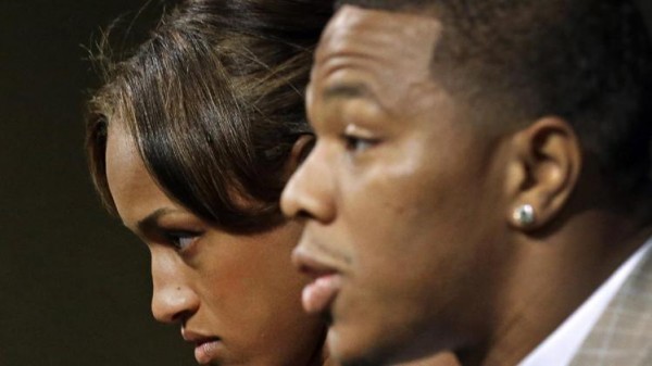 janay rice standing by husband ray images