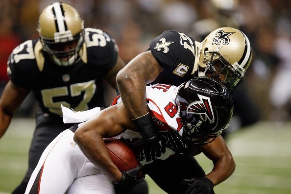 roddy white falcons gets but slammed by malcom jenkins new orleans saints nfl 2014 images