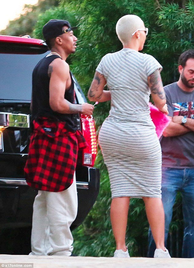 Nick Cannon Amber Rose Move Forward Into Each Other