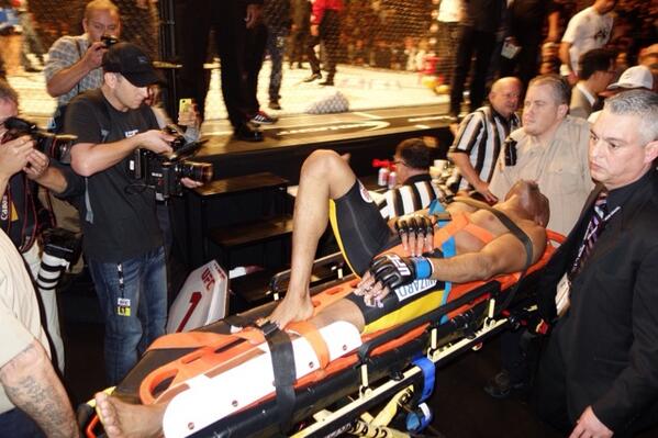 anderson silva being carried out of ufc ring 2015
