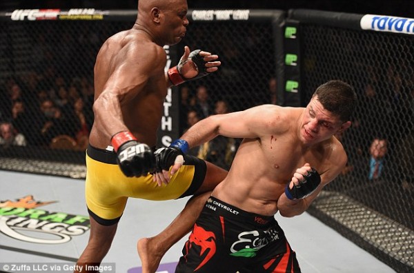 anderson silva putting knee to nick diaz back for ufc 183 2015 images