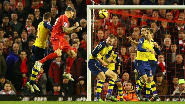 arsenal vs liverpool jumping soccer action 2015 images
