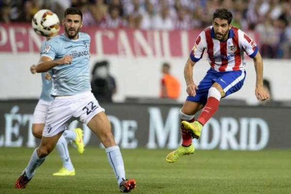 atletico madrid takes out eibar with jumping soccer bulge players 2015