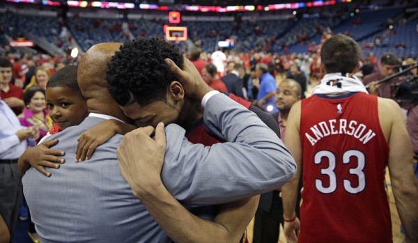 anthony davis hugging pelicans coach monty williams for playoffs nba 2015