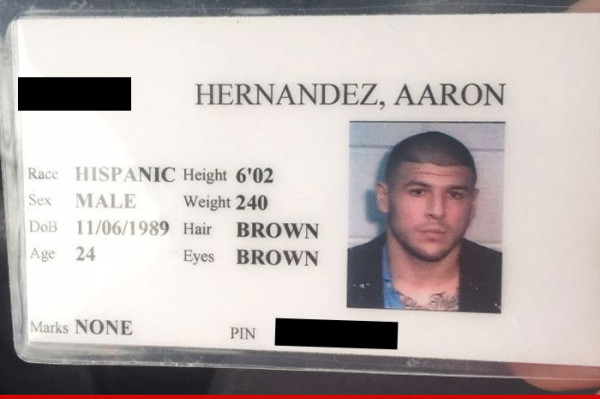 aaron hernandez jail id auctioned 2015