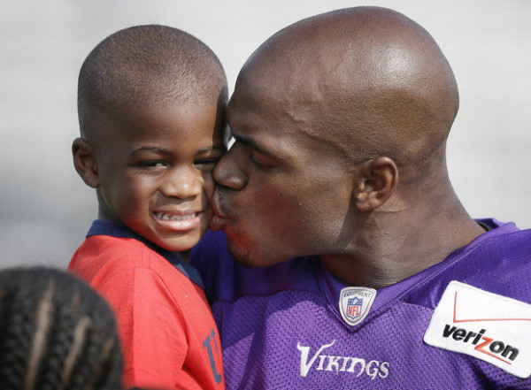 adrian peterson with son he beat on vikings 2015