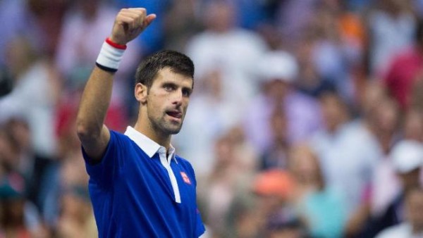 novak djokovic moves forward at paris masters 2015 tennis images