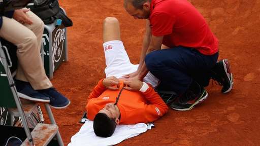 novak djokovic gets his groin worked on by medics at french open 2015