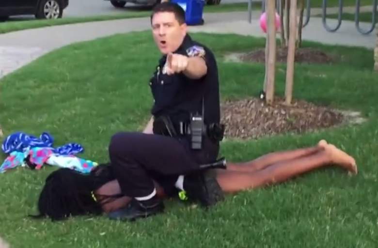 cops holding down black girl from pool party texas 2015