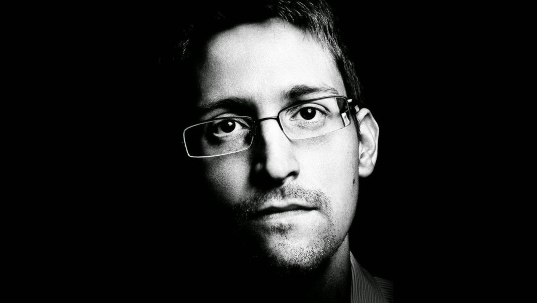 edward snowden hero or handcuffs 2015 images