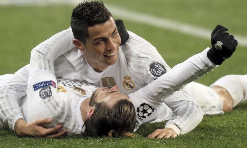 cristiano ronaldo with gareth bale laying down soccer 2016 images