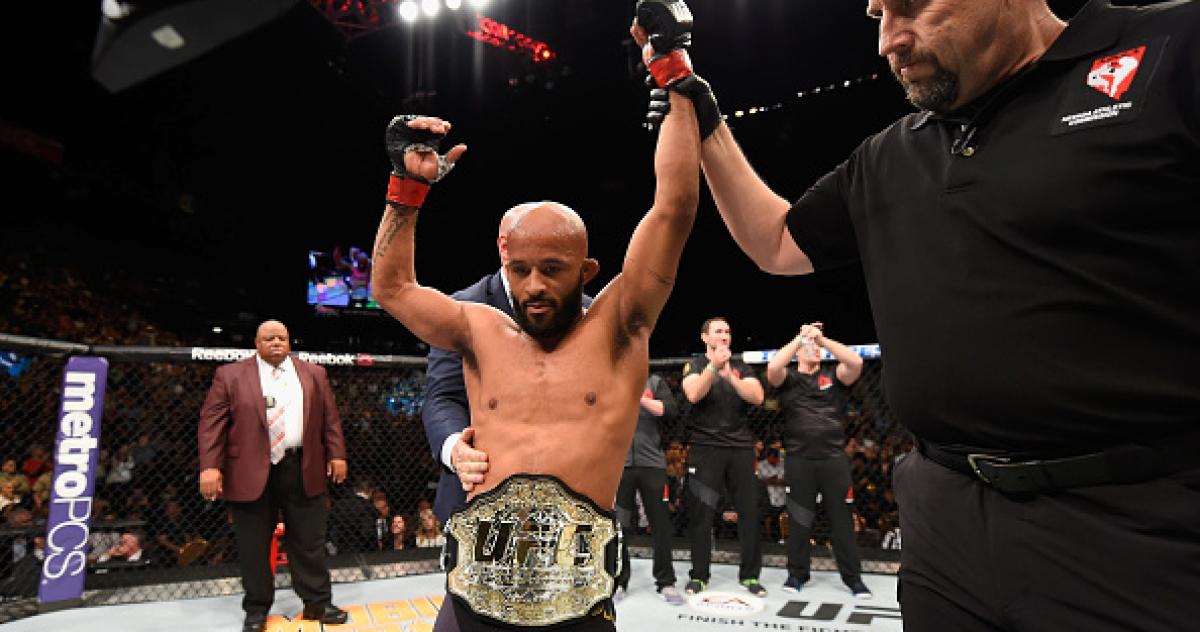 demetrious johnson holds on to title 2016 mma