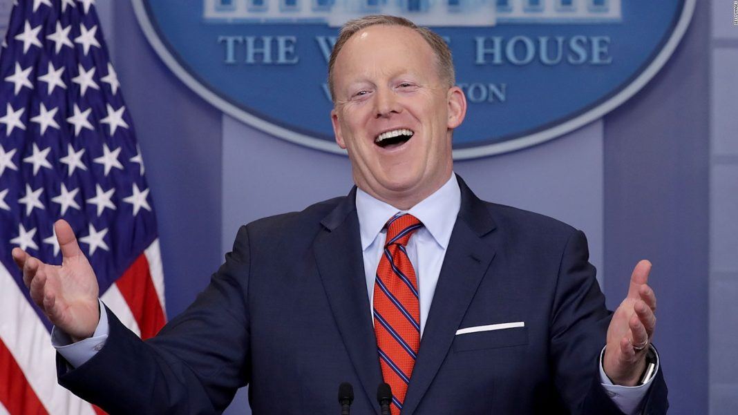 sean spicer quits while donald trump looks at pardons 2017 images