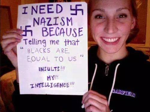 white female supremacist with sign