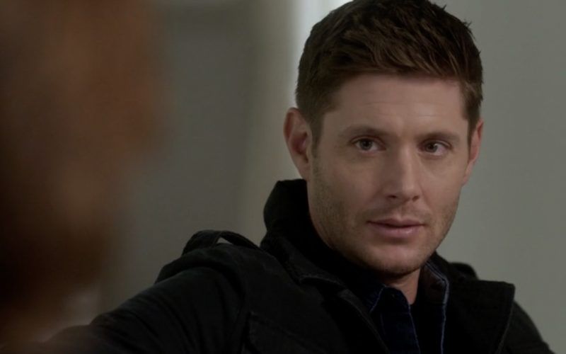 dean winchester staring intently at sam supernatural on couch