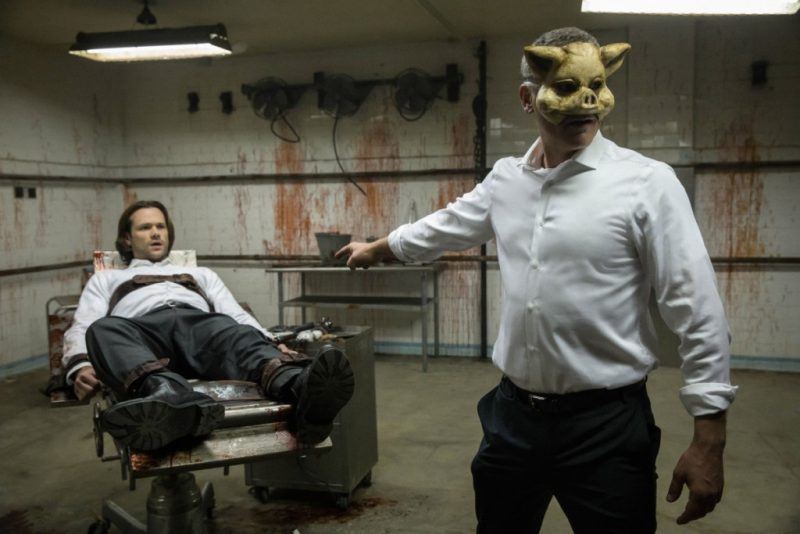 sam winchester strapped down with supernatural masked rabbit man