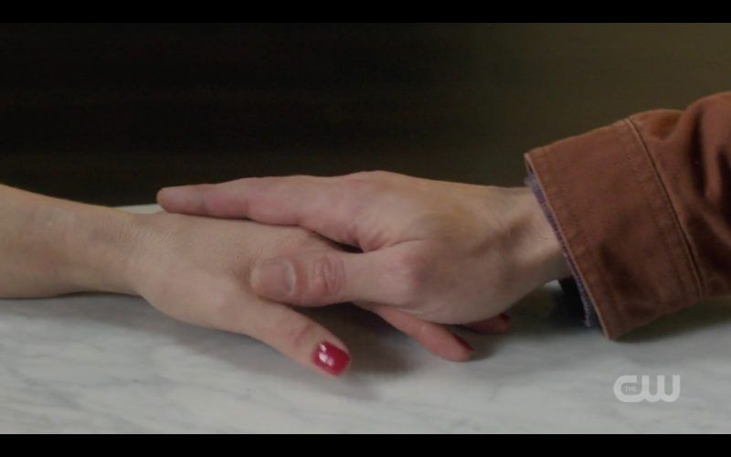 sam winchester touches woman hand supernatural 1315