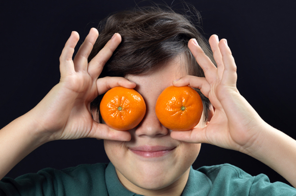 juicy baby pumpkins with clementine oranges