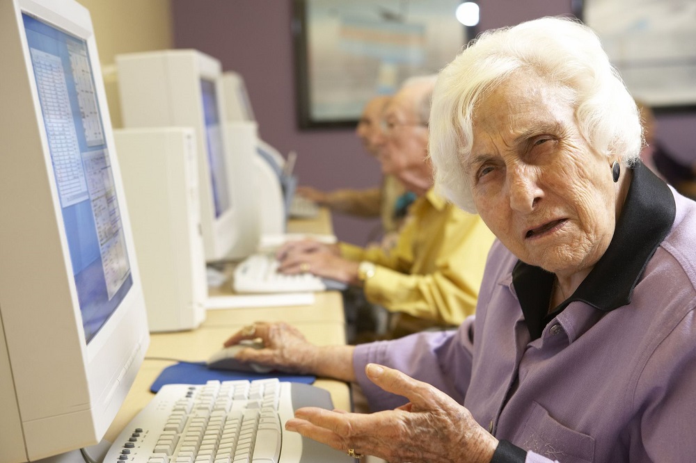 old woman trying to understand learn online slot machine games