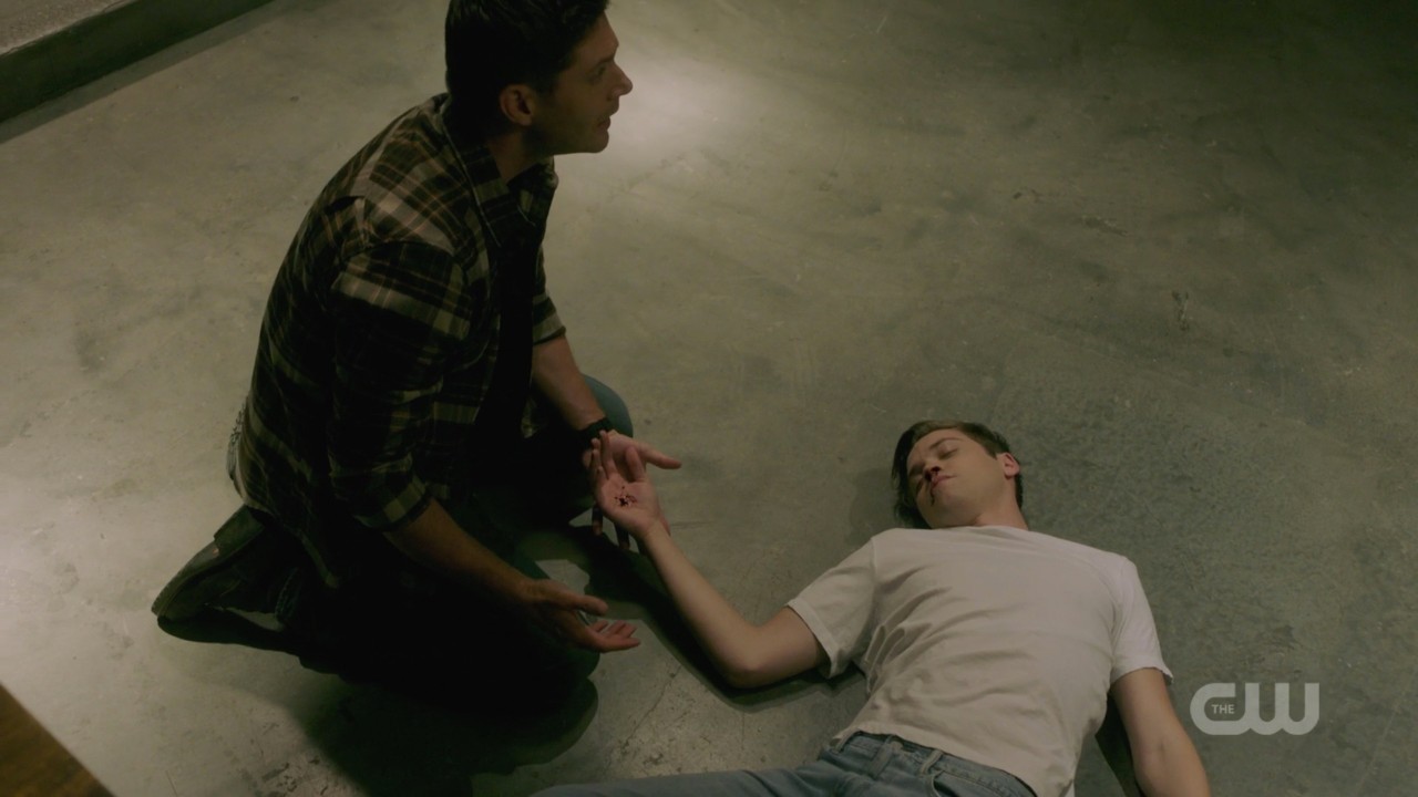 supernatural dean winchester holding collapsed alex jack hand 1406