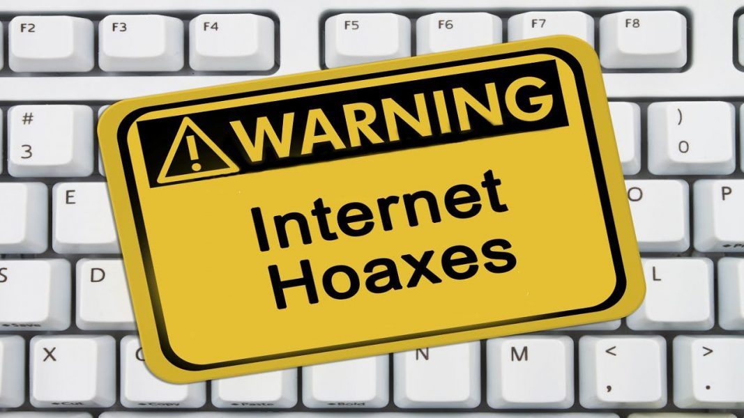 Computer keyboard warning of internet hoaxes