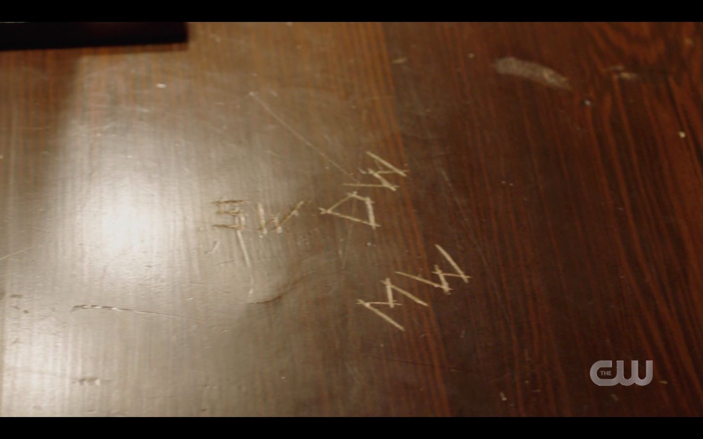 Table where Sam Dean Winchester carved their initals now with Mary Winchester initials 14.18 SPN