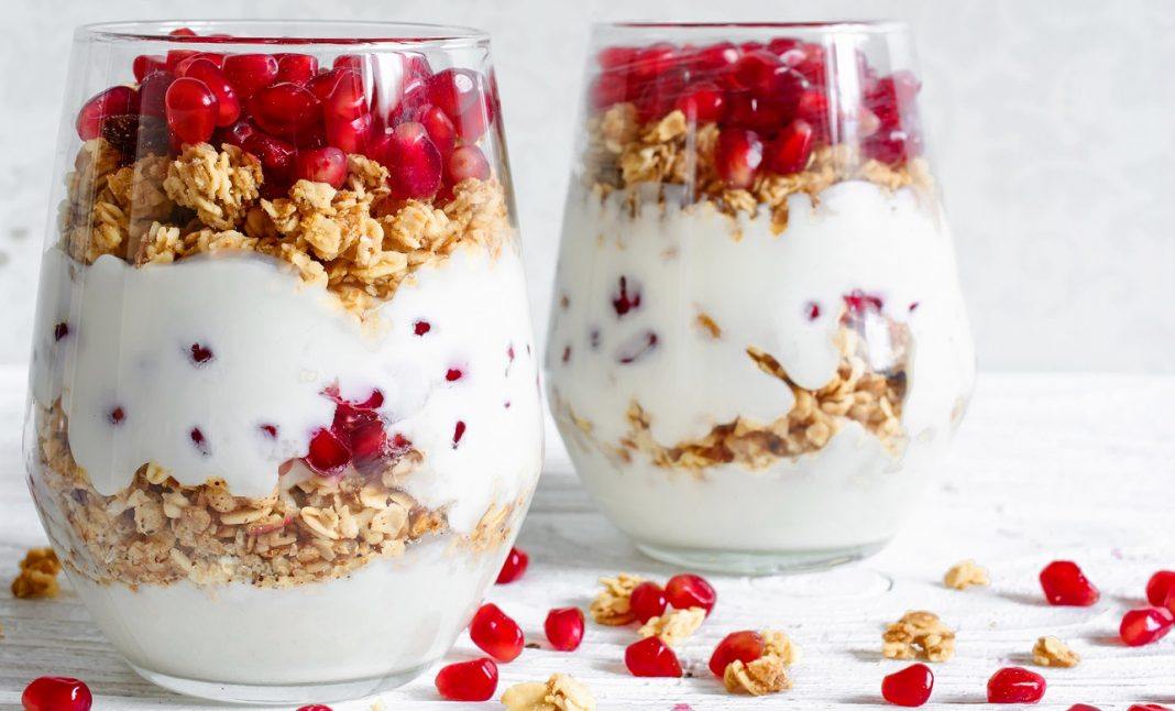 pomegranite fruit with yoguart granola healthy alternative to cereal 2019 images