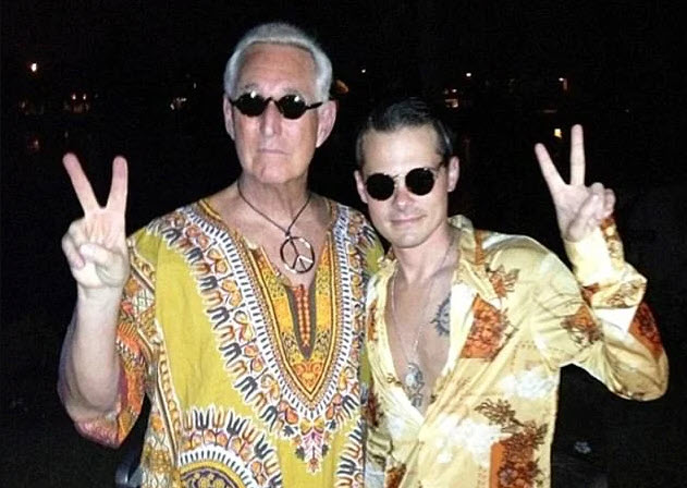 roger stone peace signing with aids andrew miller 2019
