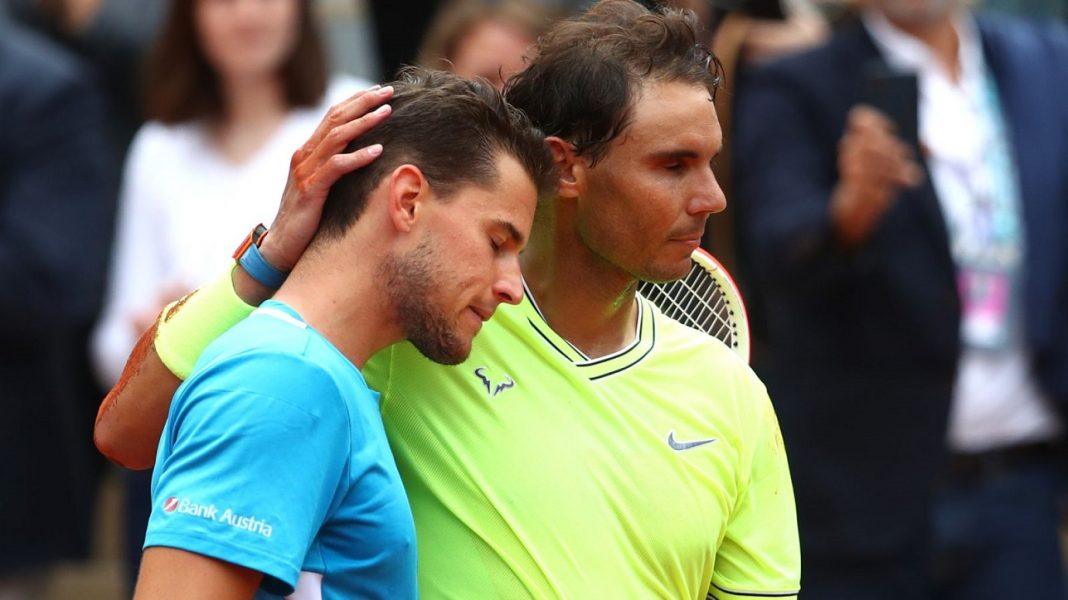 rafael nadal kept dominic thiem at bay rubbing head french open 2019 images