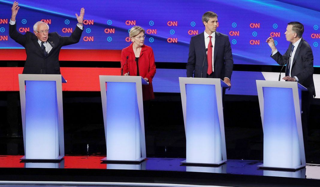 democratic debate 2 bernie sanders raising hands 2019 images