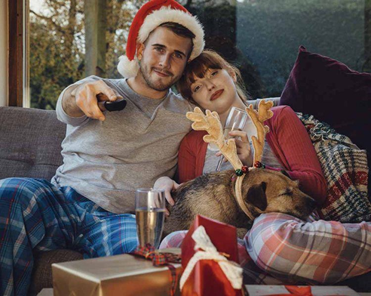 couple watching holiday home theater great gift guide 2019