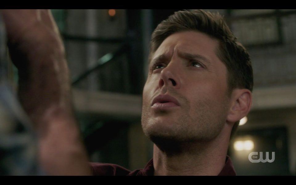 Evil Dean Winchester lifting Sam up by throat with knife 1505