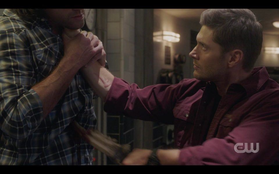 Possessed Dean Winchester stabbing Sam with big blade SPN 1505