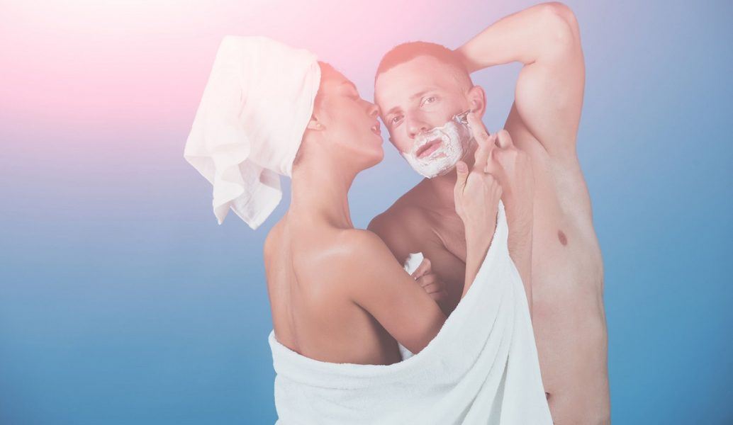 sexy woman shaving shirtless man in shower mttg