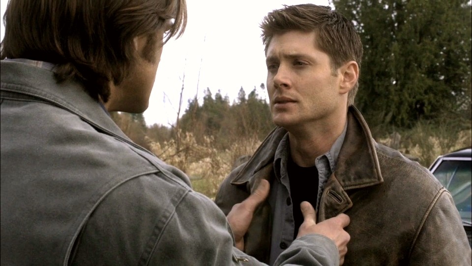 Sam Winchester gripping Dean by collar SPN Swan Song