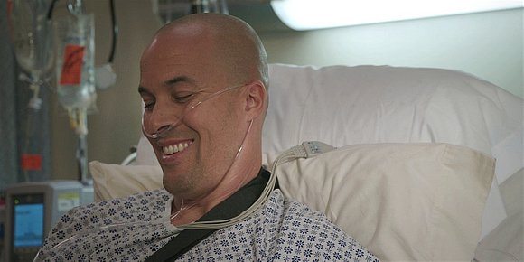 Walker James Coby Bell laughing with tubes in his nose.