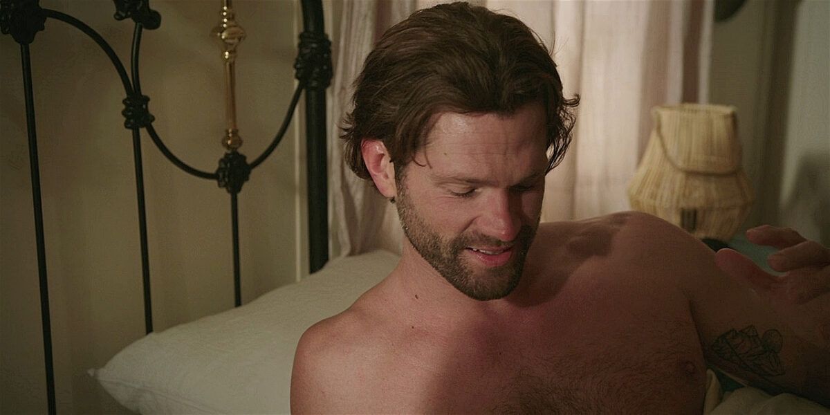 Walker Jared Padalecki looking down at his shirtless self in bed impressed with how big he gets when Jensen Ackles is on set.