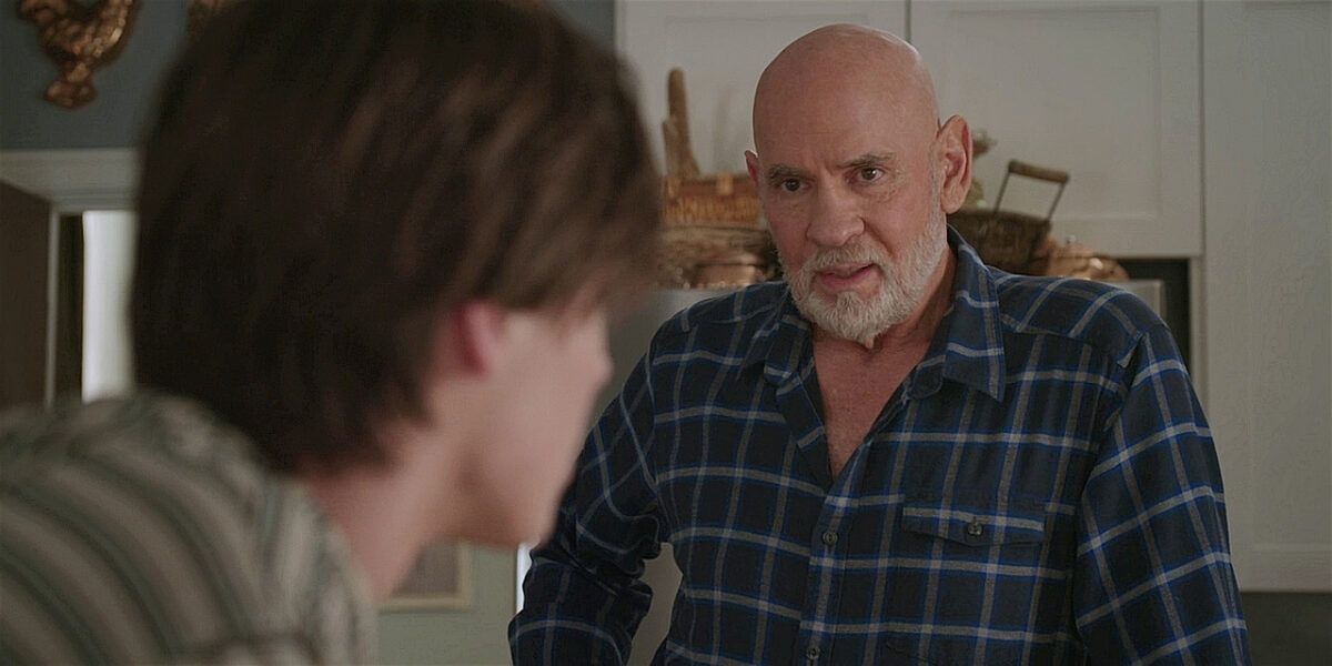 WAlker Daddy bear Mitch Pileggi showing off chest hair and bulges to Augie in his bedroom.