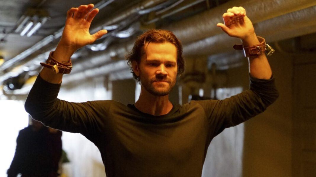 Walker 301 Jared Padalecki wtih arms up and leather cuffs on mttg