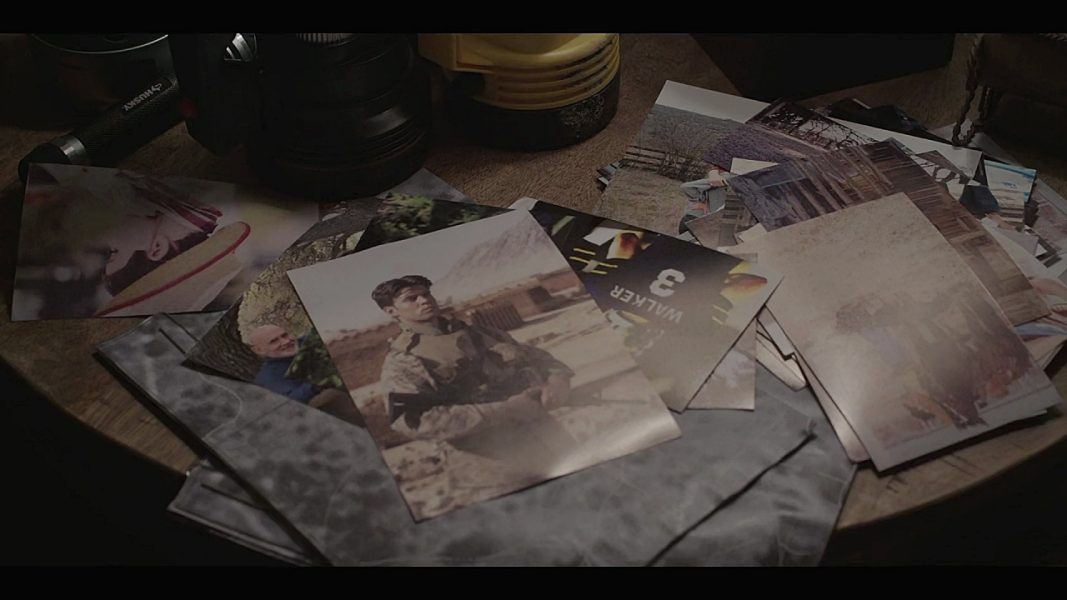 Jared Padalecki looking at hot young pictures of men in their army gear on Walker.