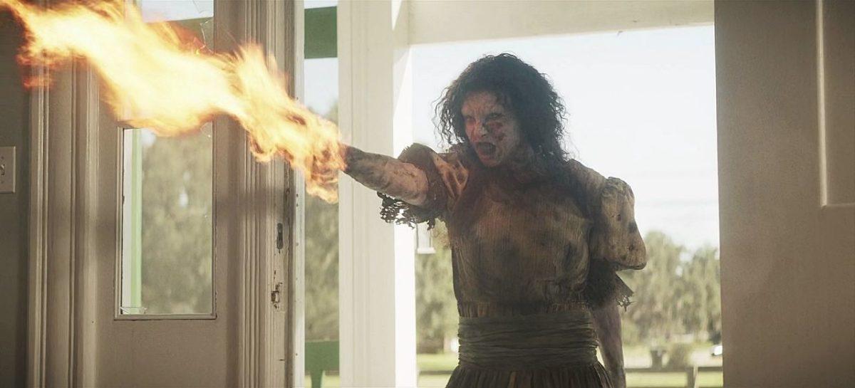 The Winchesters monster demon shooting fire out of her arm 1.06 Art of Dying.
