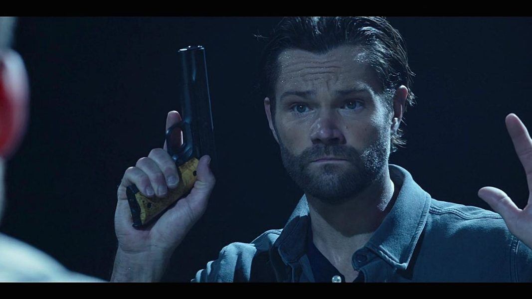 Walker Jared Padalecki putting arms up with gun for Blinded by the Light episode recap mttg.