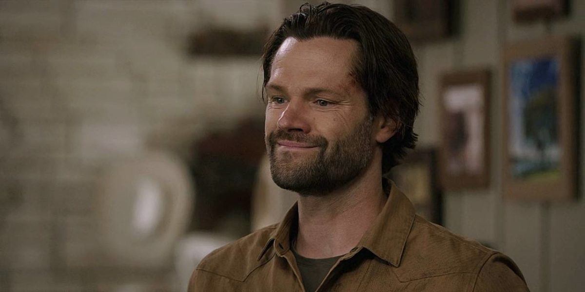 Walker Jared Padalecki giving a truly fake smile pained look on set.