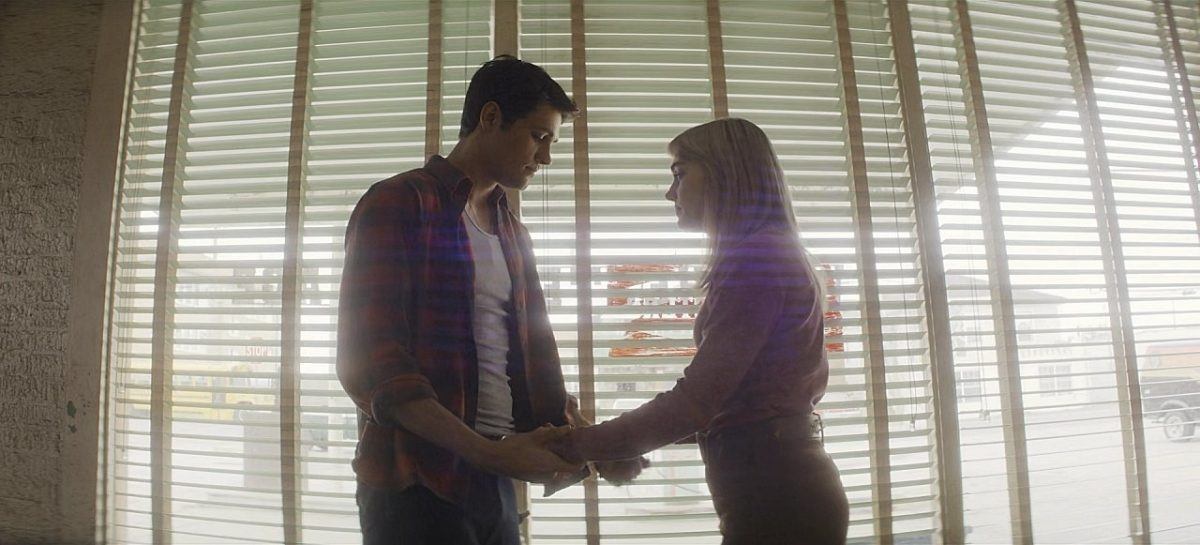 Winchesters Drake Rodger holding Meg Donnelly hands on set.