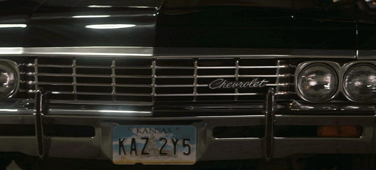 Front grill of Chevrolet Chevy Impala baby on The Winchesters with Kansas license plate.