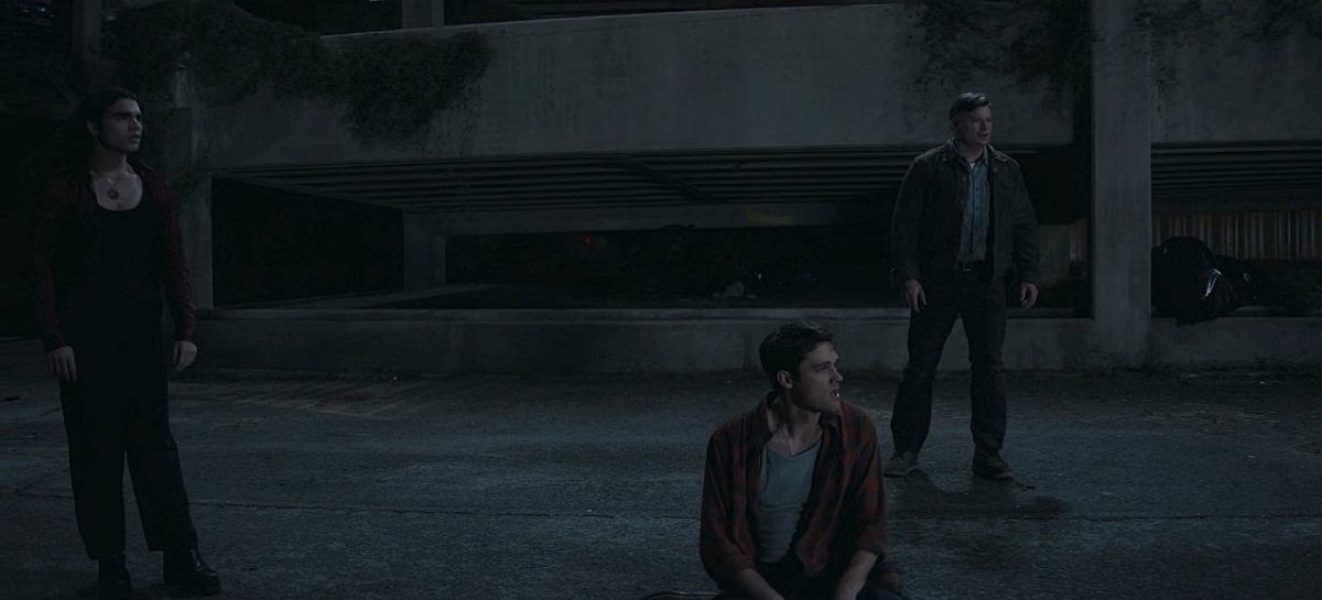 Gay Carlos and hot Drake Rodger react to blue light tearing into their world on Winchesters.