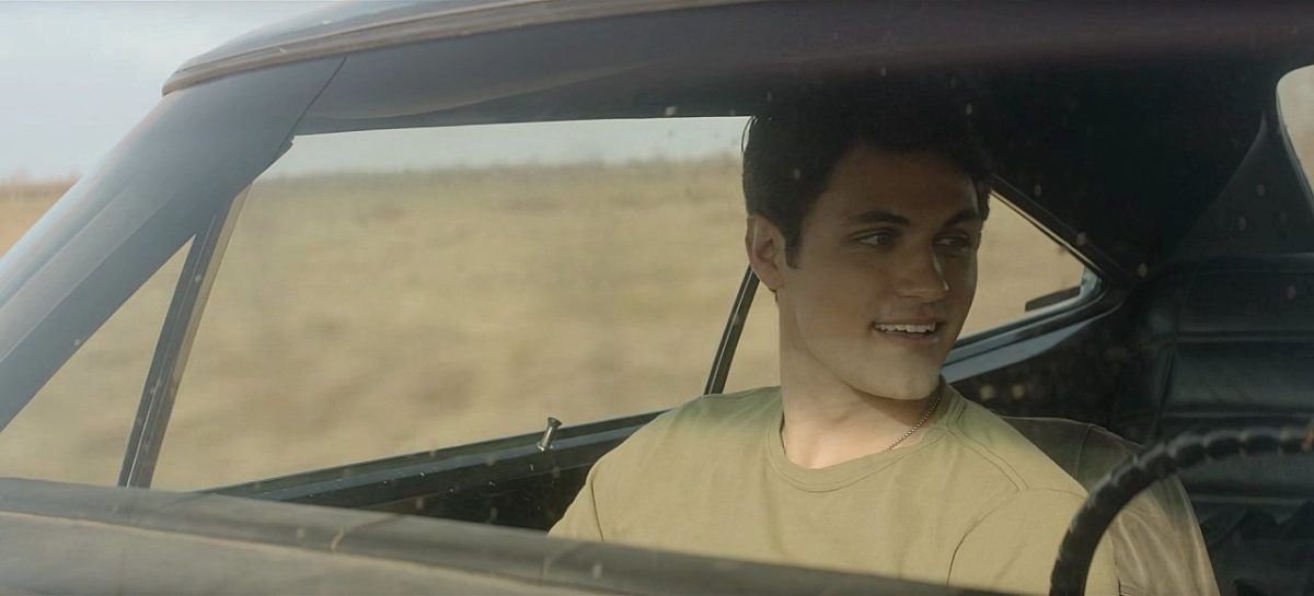 Winchesters Drake Rodger smiling at Meg Donnelly driving Baby for first time with license season 1 finale.