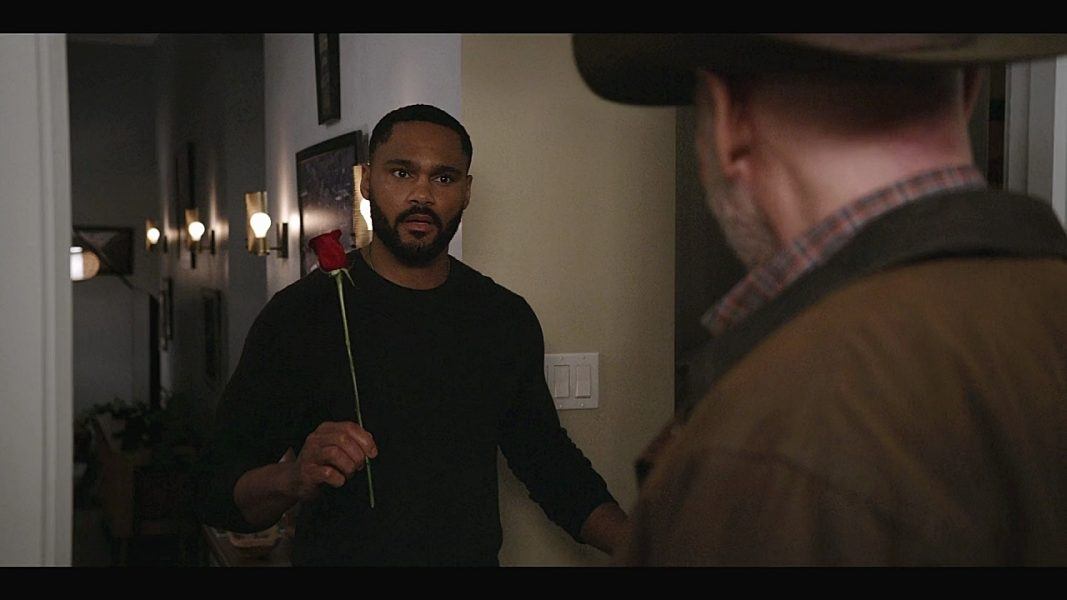 Walker Trey finds Bonham on his door with a rose.