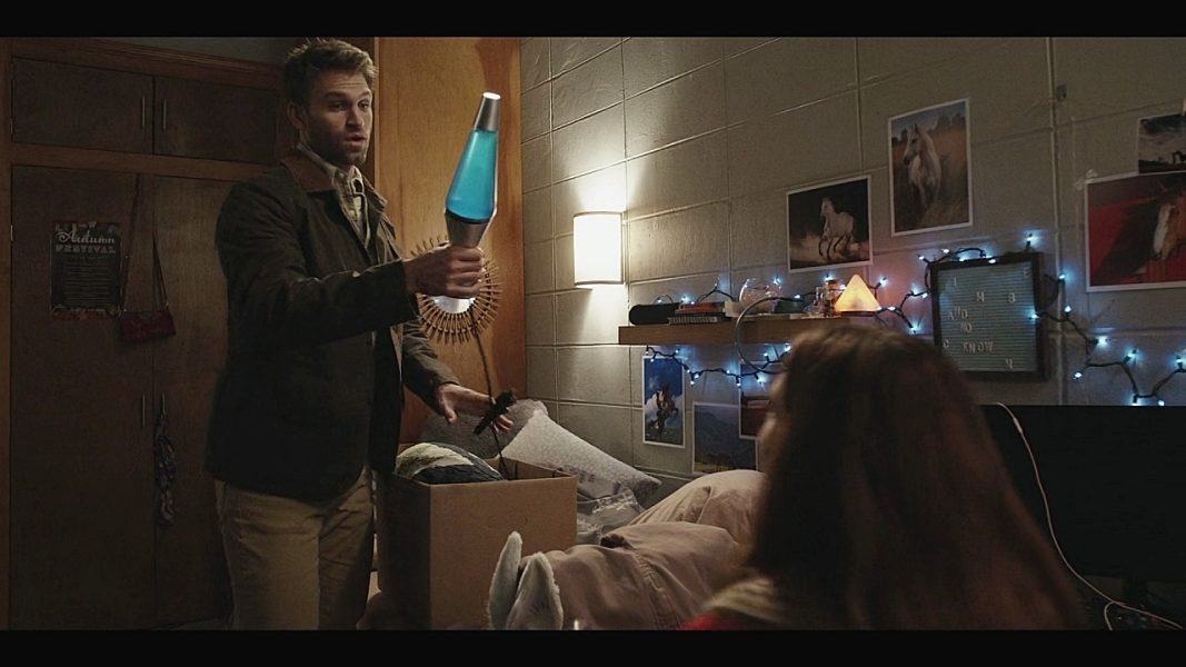 Walker gay Liam holding lava lamp showing Stella how to enjoy herself with it.