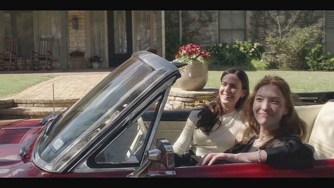 Geri and Sadie in red car Walker 4.11.